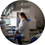 Female Arvinas scientific staffer working in the lab